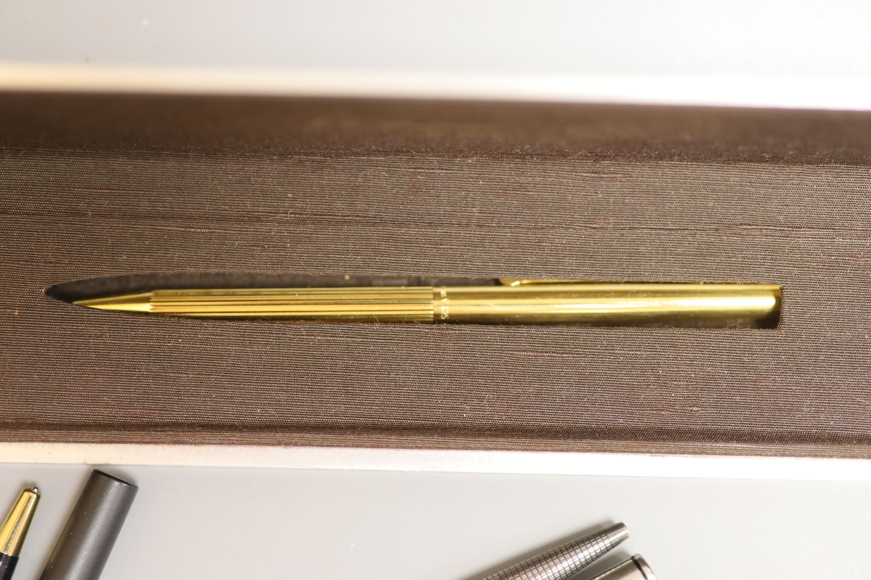 A Dupont Vermeil and blue lacquer ball pen and other pens